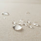  A close-up of water droplets on Rezy Sofa's sophisticated stain-resistant fabric