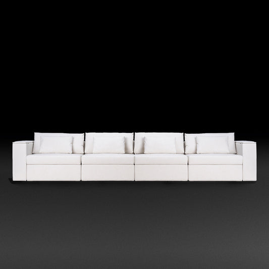 Rezy Design Sofa Store's Four-Seater Sectional Sofa furnishing with white ambient lighting.